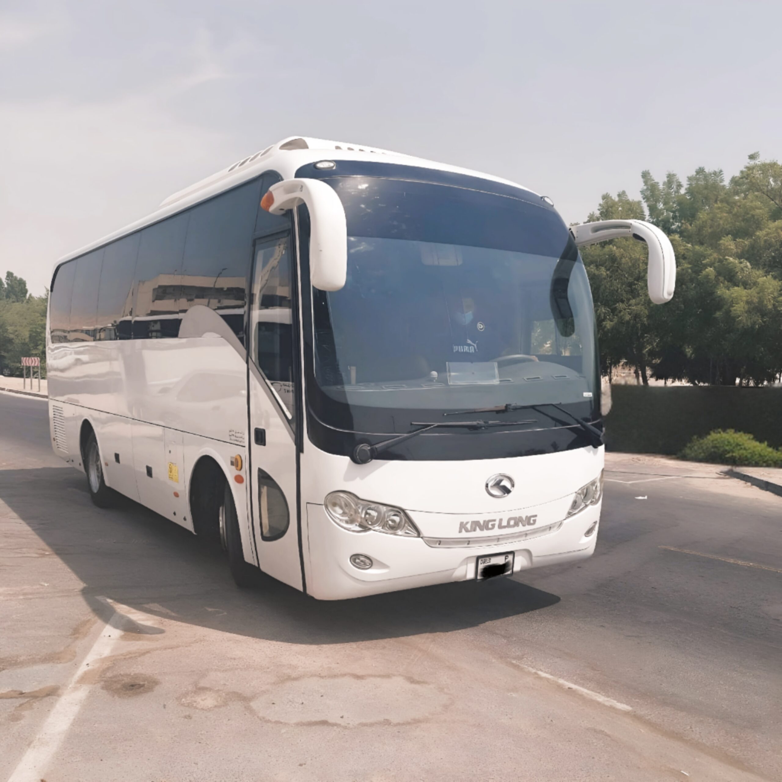 Luxury 35-seater bus interior, executive coach for group travel.